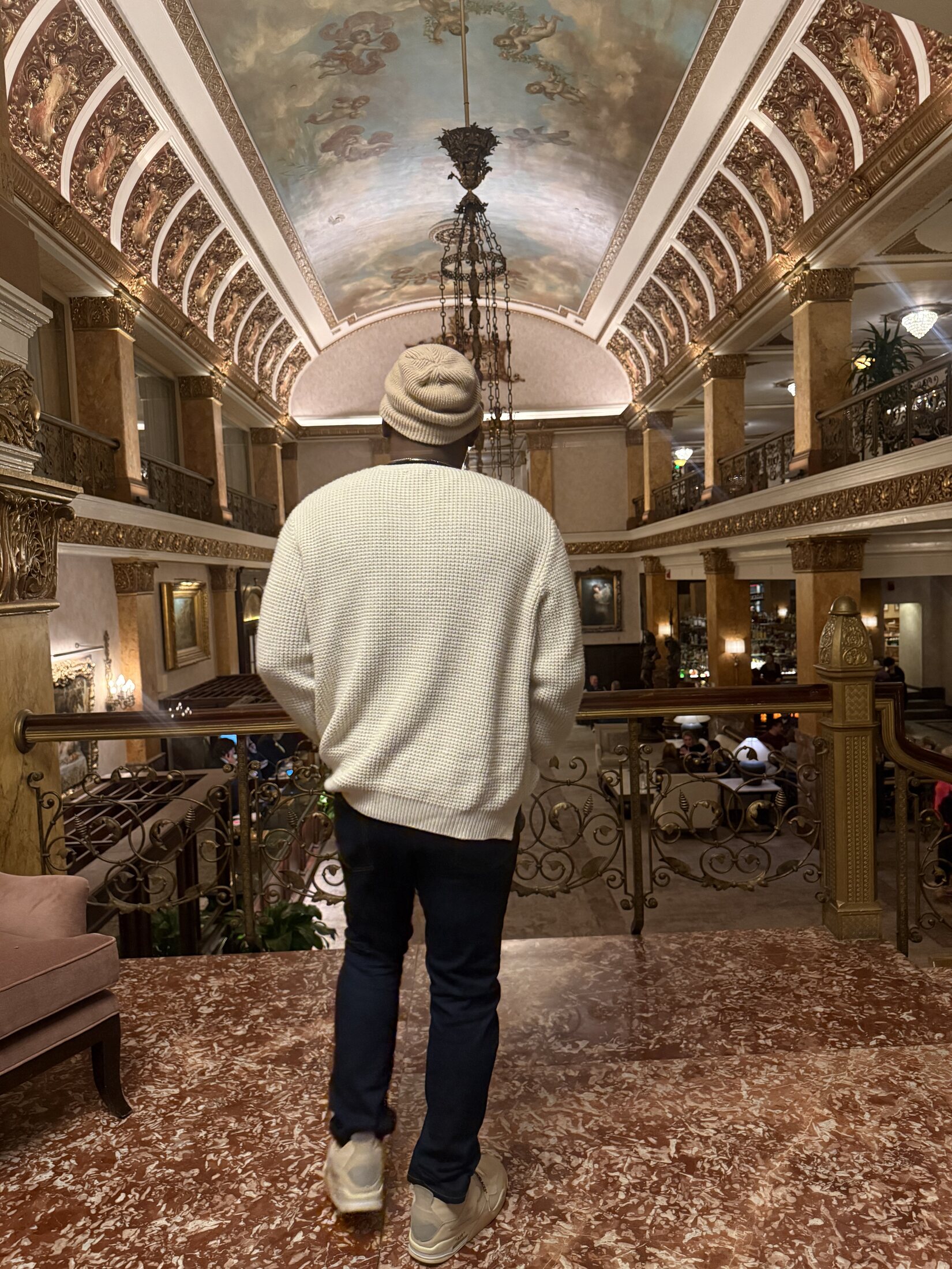 Christopher Burnam experiencing a hotel property