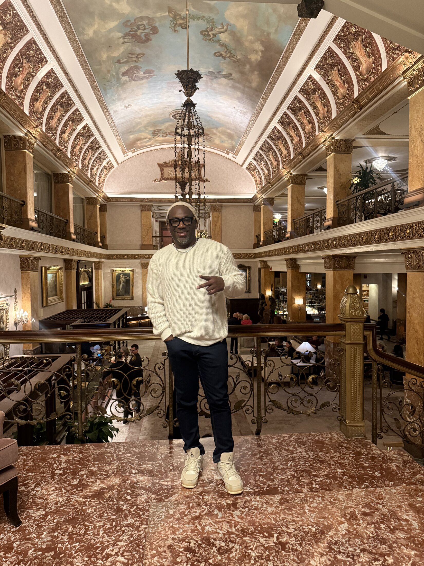 Christopher Burnam inside a luxury hotel